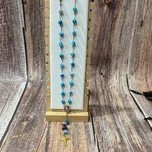 NEW Elegant Beaded 52” Blue and Purple Rosary with Cross Pendant Item #PHK2583